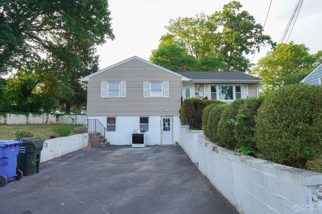 66 Willow Ave, Iselin, NJ 08830 - view of front facade featuring asphalt driveway