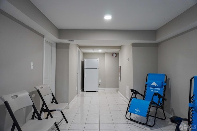 interior space with light tile patterned floors