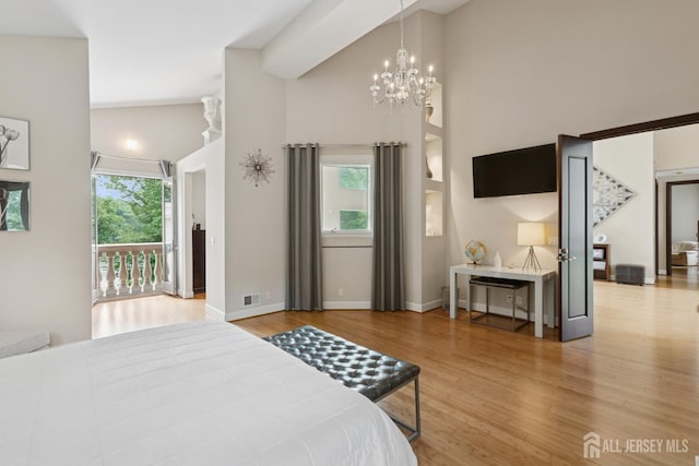 27 Mare Haven Ct, North Brunswick, NJ 08902 - bedroom with wood finished floors, a chandelier, and a high ceiling