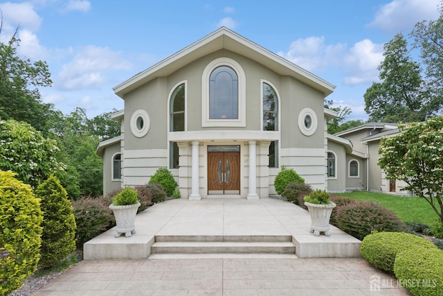 27 Mare Haven Ct, North Brunswick, NJ 08902 - view of front of property with stucco siding