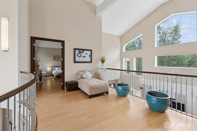 27 Mare Haven Ct, North Brunswick, NJ 08902 - living area featuring a high ceiling, wood finished floors, healthy amount of natural light, and an upstairs landing