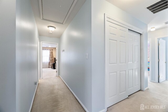 53 Rath Ln, East Brunswick, NJ 08816 - corridor with attic access and light carpet