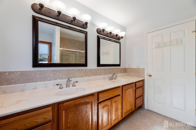 53 Rath Ln, East Brunswick, NJ 08816 - bathroom with double vanity, a shower with shower door, and tile patterned floors