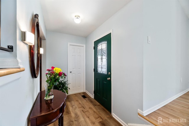 53 Rath Ln, East Brunswick, NJ 08816 - entryway featuring light wood-style floors and baseboards