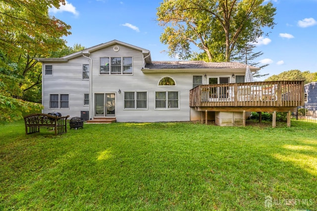 53 Rath Ln, East Brunswick, NJ 08816 - rear view of house with a wooden deck, a lawn, and entry steps