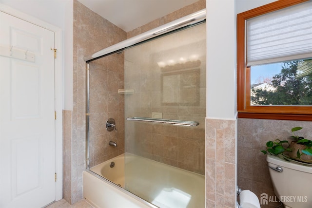 53 Rath Ln, East Brunswick, NJ 08816 - full bath featuring combined bath / shower with glass door and tile walls
