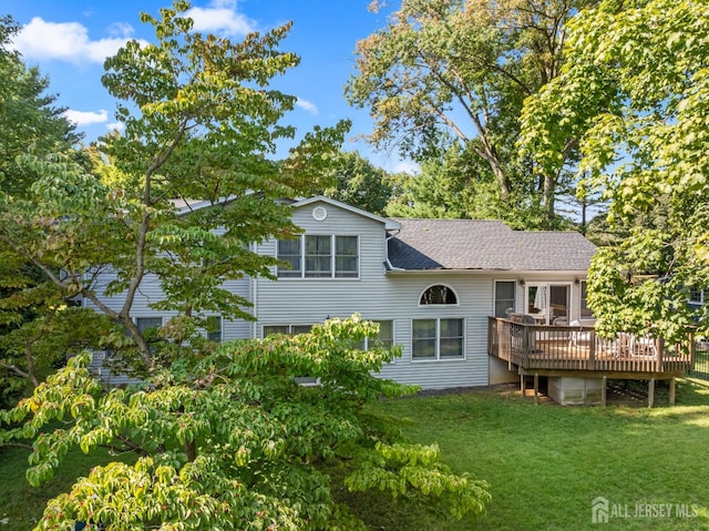 53 Rath Ln, East Brunswick, NJ 08816 - rear view of property featuring a yard, a wooden deck, and a shingled roof