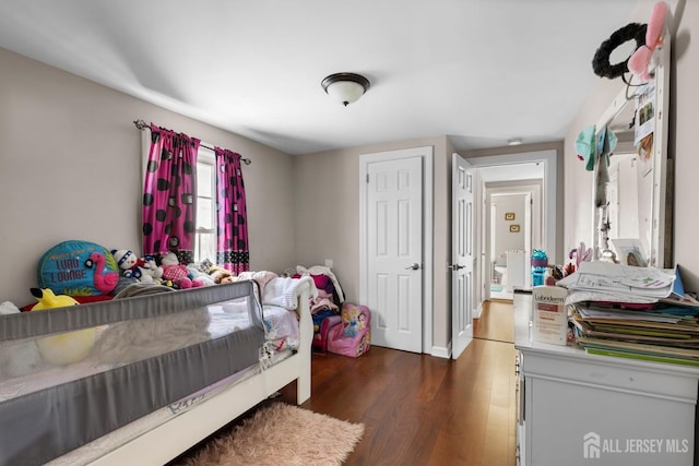 bedroom featuring dark wood-type flooring
