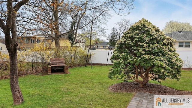 view of yard featuring fence