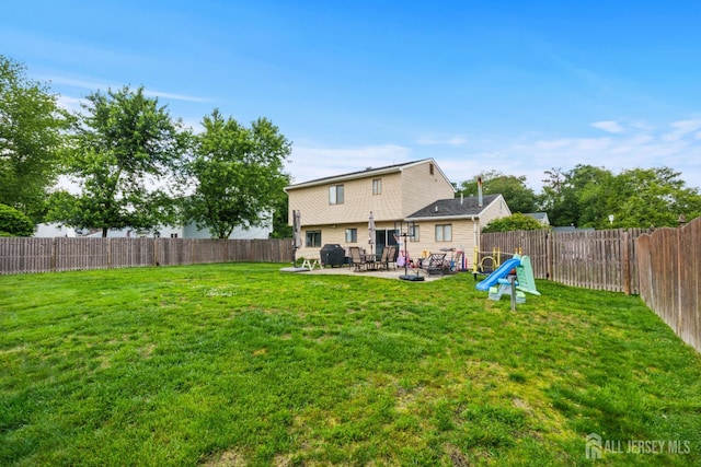 3 Mendon Ct, Howell, NJ 07731 - rear view of property featuring a patio area and a fenced backyard