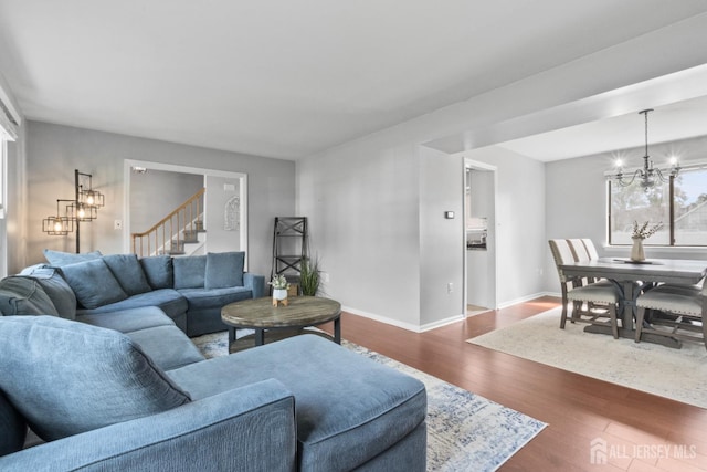 3 Mendon Ct, Howell, NJ 07731 - living area featuring a chandelier and dark wood-style floors