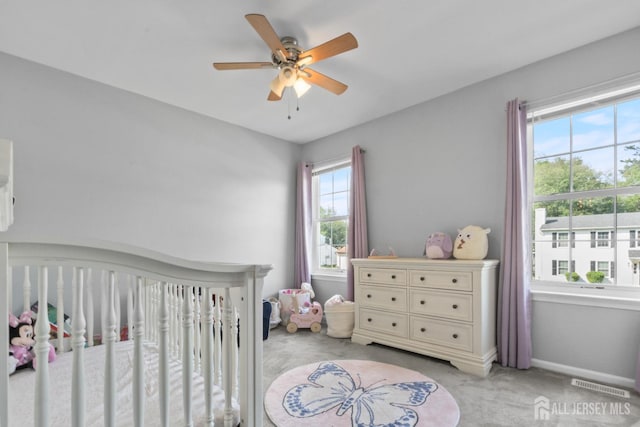 3 Mendon Ct, Howell, NJ 07731 - bedroom with a nursery area, light colored carpet, and a ceiling fan
