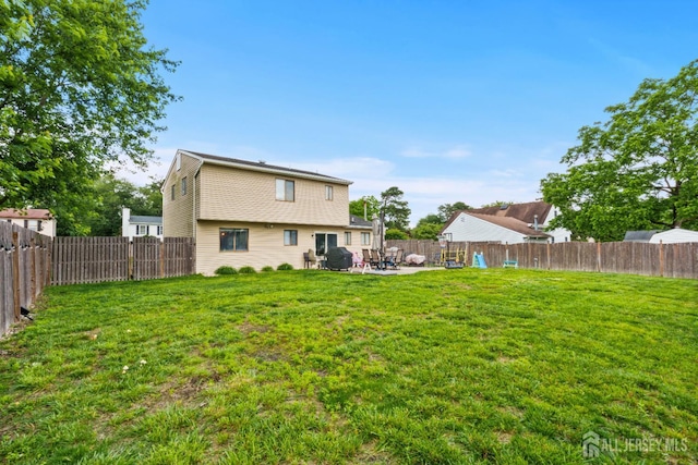 3 Mendon Ct, Howell, NJ 07731 - back of property with a patio and a fenced backyard