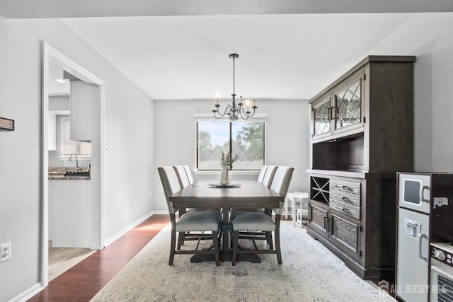 3 Mendon Ct, Howell, NJ 07731 - dining room featuring wood finished floors and a chandelier