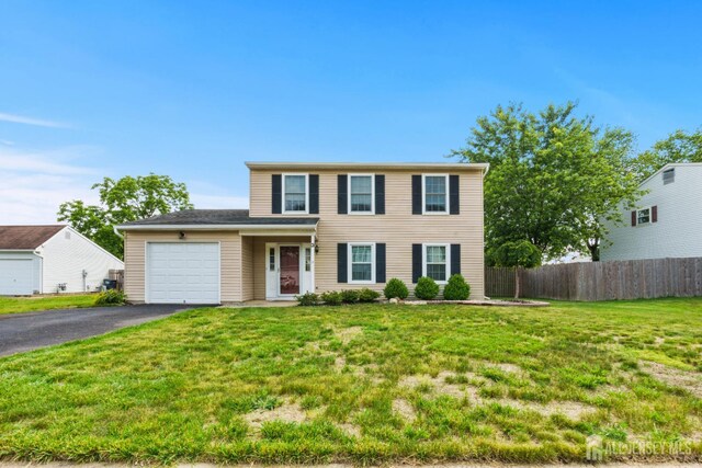 3 Mendon Ct, Howell, NJ 07731 - view of front of home featuring a garage and driveway