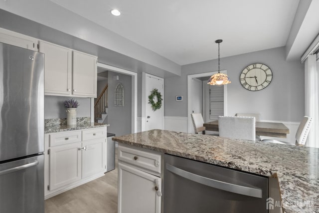 3 Mendon Ct, Howell, NJ 07731 - kitchen featuring appliances with stainless steel finishes, white cabinets, light stone counters, and recessed lighting