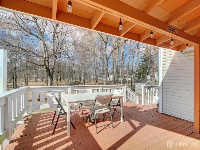 123 3rd St, Middlesex, NJ 08846 - deck featuring outdoor dining space and view of scattered trees