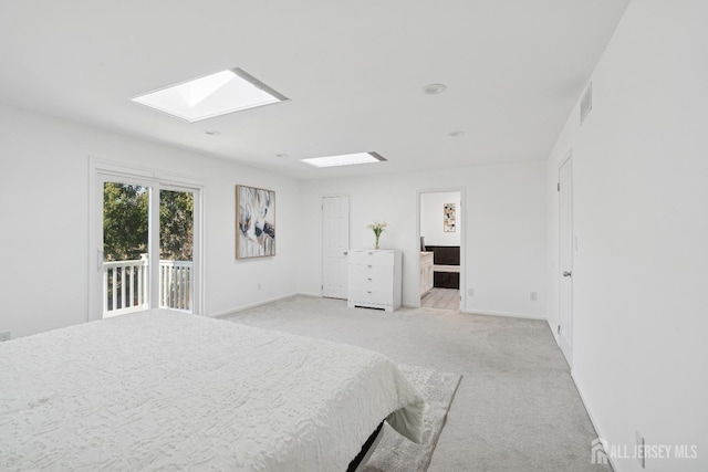 bedroom with light carpet, a skylight, visible vents, baseboards, and access to outside