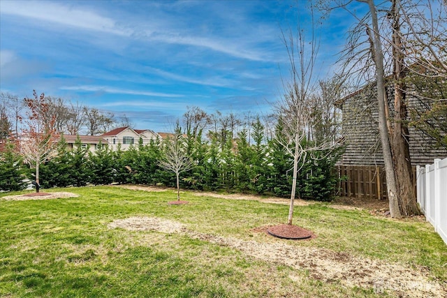view of yard with fence