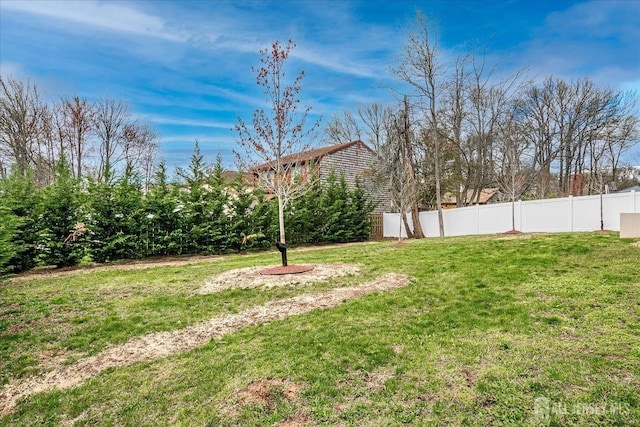 view of yard with fence
