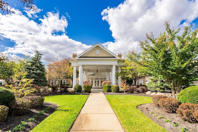 exterior space with a lawn
