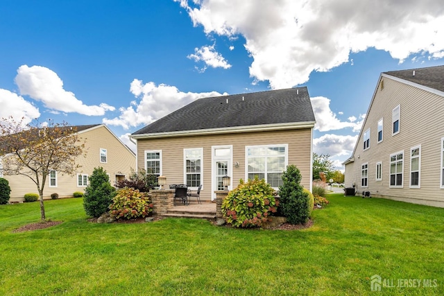 6 Diamond Spring Dr, Monroe, NJ 08831 - rear view of house featuring a lawn and a patio area