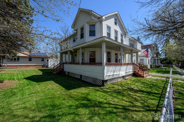 667 Seminary Ave, Rahway, NJ 07065 - view of front facade featuring a porch and a front lawn
