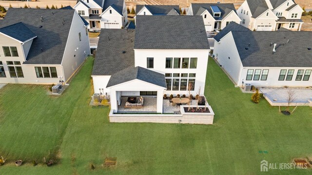 drone / aerial view with a residential view