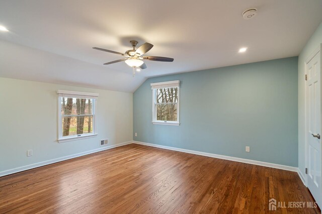 18 Back Bone Hill Rd, Millstone, NJ 08510 - empty room featuring a smoke detector, ceiling fan, wood finished floors, lofted ceiling, and baseboards