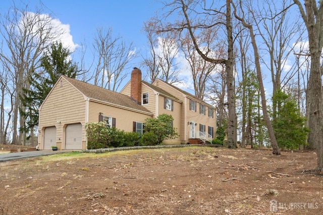 18 Back Bone Hill Rd, Millstone, NJ 08510 - view of side of property featuring a chimney and asphalt driveway