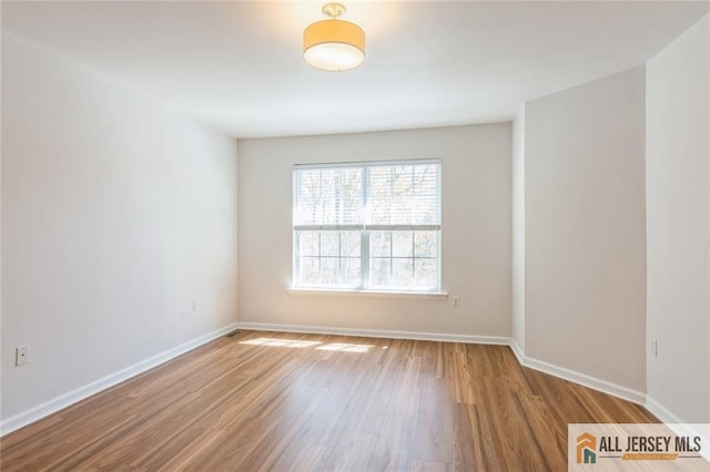 199 Pinelli Dr, Piscataway, NJ 08854 - unfurnished room featuring wood finished floors and baseboards