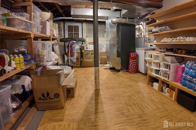 202 Jackson Ave, Edison, NJ 08837 - storage area featuring washer / clothes dryer, heating unit, and water heater