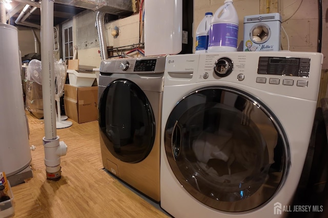 202 Jackson Ave, Edison, NJ 08837 - clothes washing area featuring independent washer and dryer, concrete block wall, water heater, and wood finished floors