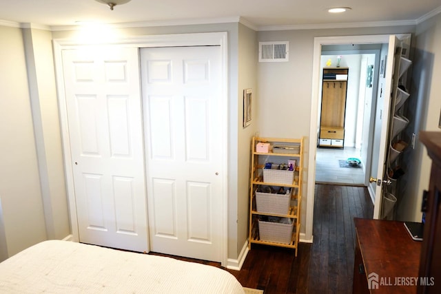 709 Wadsworth Ave, South Plainfield, NJ 07080 - bedroom with dark wood finished floors, a closet, ornamental molding, and recessed lighting
