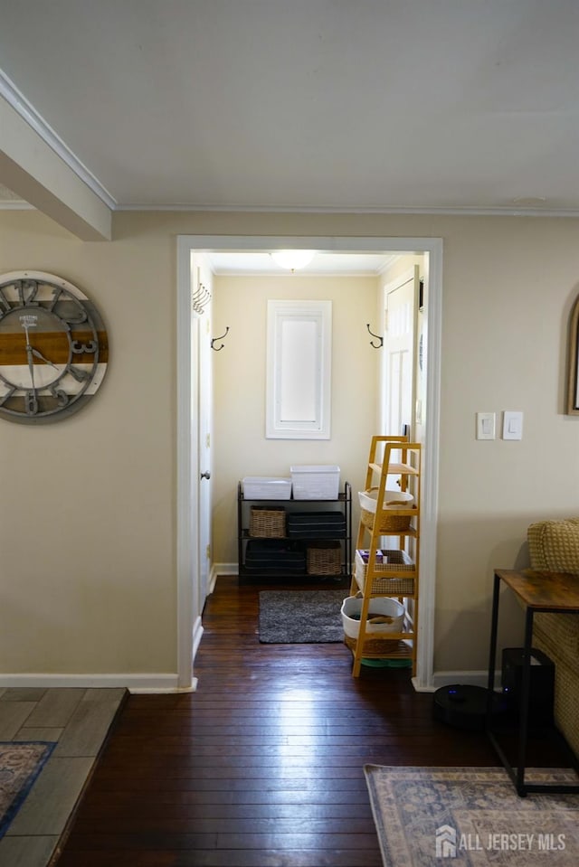 709 Wadsworth Ave, South Plainfield, NJ 07080 - hall featuring dark wood-style floors and ornamental molding