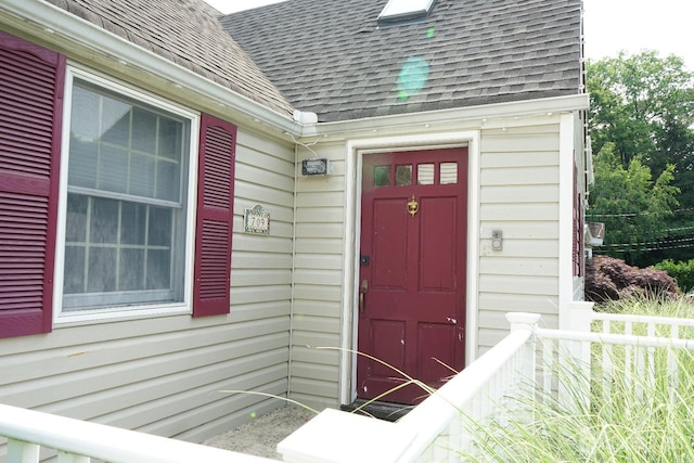 709 Wadsworth Ave, South Plainfield, NJ 07080 - doorway to property featuring a shingled roof