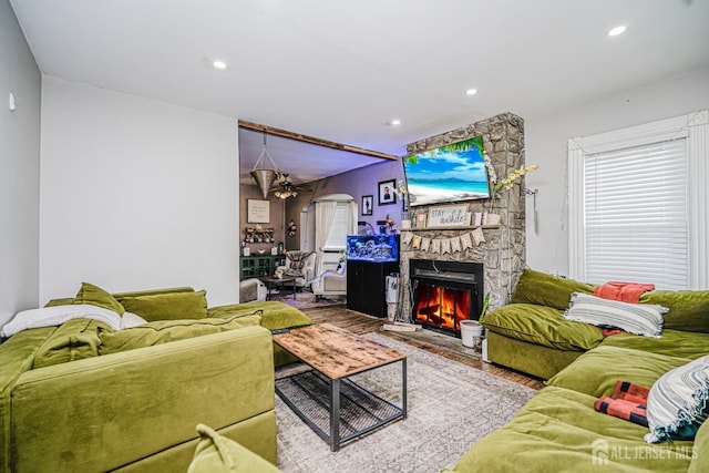 10 W Church St, Jamesburg, NJ 08831 - living area with a stone fireplace, a ceiling fan, wood finished floors, and recessed lighting