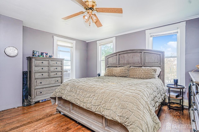10 W Church St, Jamesburg, NJ 08831 - bedroom with wood finished floors and ceiling fan