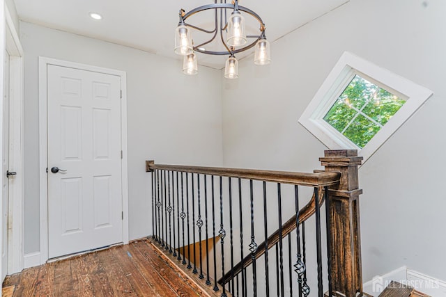 10 W Church St, Jamesburg, NJ 08831 - corridor with an upstairs landing, a chandelier, wood finished floors, and recessed lighting