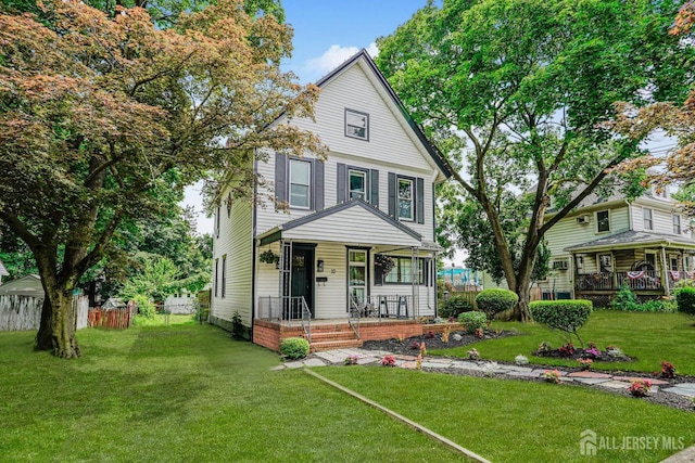 10 W Church St, Jamesburg, NJ 08831 - view of front of house with covered porch