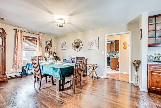 114 Garden Ter, Edison, NJ 08817 - dining area with wood finished floors and baseboards