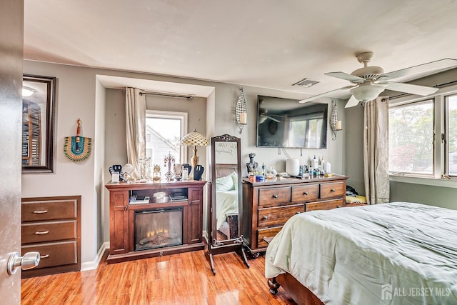 114 Garden Ter, Edison, NJ 08817 - bedroom with wood finished floors, multiple windows, and ceiling fan