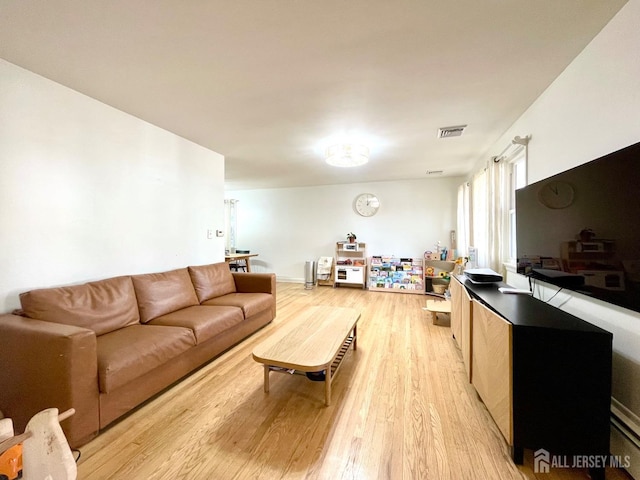 living room featuring light wood-type flooring