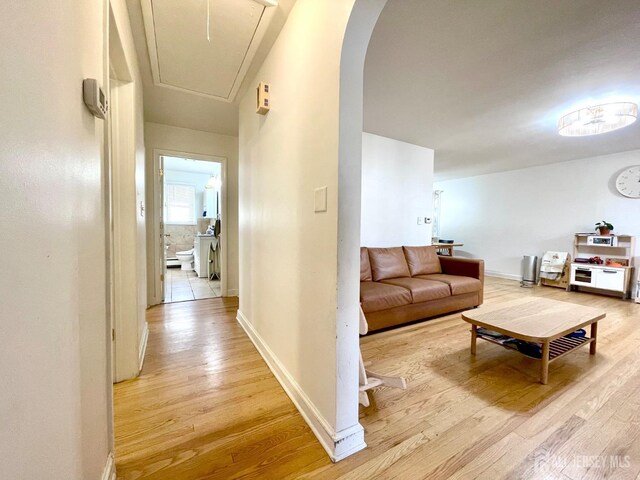 hallway featuring light hardwood / wood-style flooring