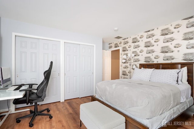 22 Fairway Blvd, Monroe, NJ 08831 - bedroom featuring two closets, wood finished floors, and a desk
