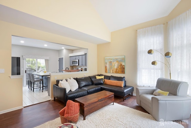 22 Fairway Blvd, Monroe, NJ 08831 - living area with wood finished floors, vaulted ceiling, and recessed lighting