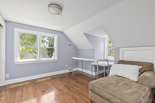 261 New Market Rd, Dunellen, NJ 08812 - bedroom with multiple windows, wood finished floors, and lofted ceiling