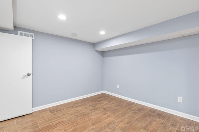 261 New Market Rd, Dunellen, NJ 08812 - finished basement featuring wood finished floors and recessed lighting