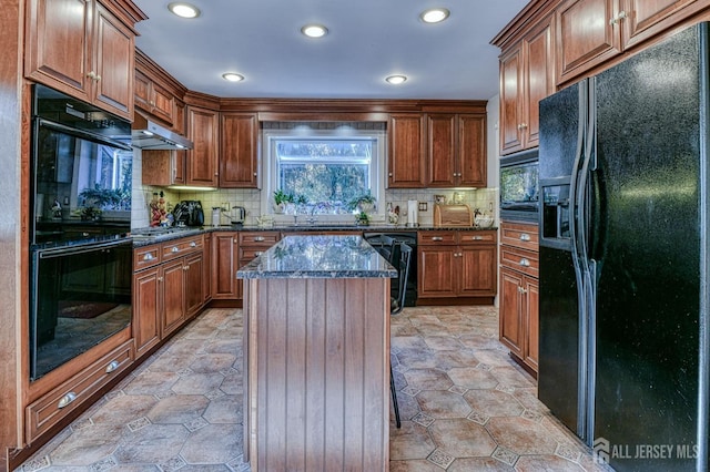 815 Marlboro Rd, Old Bridge, NJ 08857 - kitchen featuring black appliances, decorative backsplash, recessed lighting, dark stone countertops, and a center island