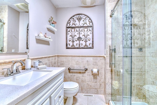 815 Marlboro Rd, Old Bridge, NJ 08857 - bathroom with vanity, a shower stall, tile walls, and wainscoting